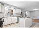 Bright kitchen featuring stainless steel appliances, granite countertops, and tiled flooring at 1313 Oakwood Trl, Indianapolis, IN 46260