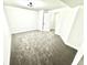 An open basement space, bright with new carpeting, white trim, and a modern ceiling light at 14596 Toponas Pl, Fishers, IN 46040