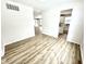 Bright and airy living room offering an open plan layout with seamless flow into the modern kitchen space at 14596 Toponas Pl, Fishers, IN 46040