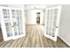 Bright living room featuring stylish french doors and beautiful floors that offer an open and inviting atmosphere at 14596 Toponas Pl, Fishers, IN 46040