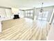 Expansive living room with a cozy fireplace and built-in shelving, perfect for entertaining and relaxation at 14596 Toponas Pl, Fishers, IN 46040