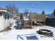 Backyard features a wooden deck area and fire pit, perfect for relaxing and outdoor enjoyment at 1524 S K St, Elwood, IN 46036