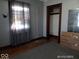 Bedroom featuring carpet flooring and a large window at 1524 S K St, Elwood, IN 46036