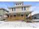 Charming two-story home featuring a spacious front porch and a classic design at 17 Parkview Ave, Indianapolis, IN 46201