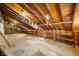 Spacious attic space with exposed beams and built-in shelving at 1828 W 750 S, Trafalgar, IN 46181