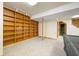 Finished basement includes a bookcase and view into an adjacent room at 1828 W 750 S, Trafalgar, IN 46181