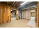 Unfinished basement with concrete walls and floor, access to other areas at 1828 W 750 S, Trafalgar, IN 46181