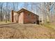 Charming single-Gathering brick home nestled on a wooded lot with a deck at 1828 W 750 S, Trafalgar, IN 46181