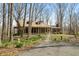 Charming home with a welcoming, covered porch and blooming spring flowers along the walkway at 1828 W 750 S, Trafalgar, IN 46181