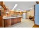 Kitchen with granite counters, white appliances and tile floors at 1828 W 750 S, Trafalgar, IN 46181