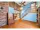 Living room features hardwood floors, and a view into the Kitchen at 1828 W 750 S, Trafalgar, IN 46181