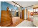 Inviting staircase with hardwood floors, complemented by a staircase and natural light at 1828 W 750 S, Trafalgar, IN 46181