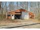Large outdoor shed with a large door and window for various uses at 1828 W 750 S, Trafalgar, IN 46181