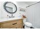 Bright bathroom with stylish black fixtures and striped shower curtain at 2109 Elmwood Dr, Lebanon, IN 46052