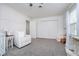 Inviting Bedroom with a comfortable chair and natural light at 2109 Elmwood Dr, Lebanon, IN 46052
