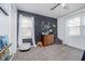 Charming bedroom featuring gray wall paneling, and a playful tractor theme at 2109 Elmwood Dr, Lebanon, IN 46052