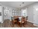 Charming dining room with a classic table, stylish chandelier, and natural light at 2109 Elmwood Dr, Lebanon, IN 46052