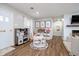 Inviting living room with play area, ample lighting, and modern flooring at 2109 Elmwood Dr, Lebanon, IN 46052