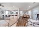 Open floor plan connecting the kitchen, living room, and dining area at 2109 Elmwood Dr, Lebanon, IN 46052