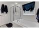 Bathroom with a soaking tub and a separate shower with modern features at 2180 Quarter Path Rd, Cicero, IN 46034