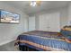 Comfortable bedroom featuring mounted tv and closet at 2180 Quarter Path Rd, Cicero, IN 46034