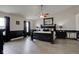 Spacious main bedroom with a dark wood bed frame and neutral walls at 2180 Quarter Path Rd, Cicero, IN 46034