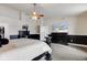 Relaxing bedroom with a mounted TV and a view from the comfort of your bed at 2180 Quarter Path Rd, Cicero, IN 46034
