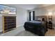 Nice bedroom with a mounted TV, closet and side tables at 2180 Quarter Path Rd, Cicero, IN 46034