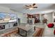Spacious living room with an open floor plan, connecting the kitchen and dining areas at 2180 Quarter Path Rd, Cicero, IN 46034