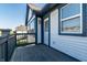 Balcony featuring a wooden deck and a side view of the exterior of the home at 2357 Central Ave, Indianapolis, IN 46205