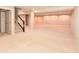 Spacious basement with carpet flooring, neutral paint, and a staircase to the upper level at 2564 Tangleridge Ln, Brownsburg, IN 46112