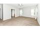 Large bedroom featuring carpeted floors, natural light and access to the bathroom at 2564 Tangleridge Ln, Brownsburg, IN 46112