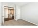 Cozy bedroom with light walls, carpeted floors and French doors leading to the hall at 2564 Tangleridge Ln, Brownsburg, IN 46112