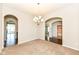 Elegant dining room featuring neutral walls, carpet floors and archways at 2564 Tangleridge Ln, Brownsburg, IN 46112