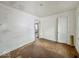 Empty bedroom featuring hardwood floors, a window and white walls at 3049 Foltz St, Indianapolis, IN 46241