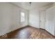 Bedroom with hardwood floors, a window and white walls at 3049 Foltz St, Indianapolis, IN 46241