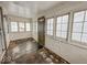 Enclosed porch with ample windows providing natural light and additional living space at 3049 Foltz St, Indianapolis, IN 46241