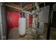 Furnace and water heater in an unfinished basement at 3829 N Temple Ave, Indianapolis, IN 46205