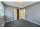 Bedroom featuring closet and an attached bathroom at 3829 N Temple Ave, Indianapolis, IN 46205