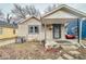 Charming single-Gathering home featuring a cozy front porch and neutral siding at 3829 N Temple Ave, Indianapolis, IN 46205