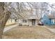 Charming single-Gathering home featuring a cozy front porch, mature trees, and neutral siding at 3829 N Temple Ave, Indianapolis, IN 46205