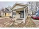 Charming single-Gathering home featuring a cozy front porch and neutral siding at 3829 N Temple Ave, Indianapolis, IN 46205