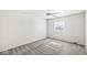 Bright bedroom featuring neutral walls, carpet, and a ceiling fan at 3986 Braddock Rd, Indianapolis, IN 46268