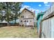 Expansive backyard with a two-story home, promising ample space for relaxation and recreation at 4029 Broadway St, Indianapolis, IN 46205
