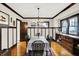 Elegant dining room featuring hardwood floors, classic trim, and a chandelier at 4029 Broadway St, Indianapolis, IN 46205