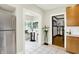 Open kitchen featuring bright countertops and hardwood floors with views to the breakfast nook at 4029 Broadway St, Indianapolis, IN 46205