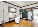 Bright living room features beautiful hardwood floors, dark trim, and stylish accents at 4029 Broadway St, Indianapolis, IN 46205