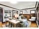 Cozy living room featuring a decorative fireplace and stylish decor at 4029 Broadway St, Indianapolis, IN 46205