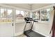 Sunroom with a treadmill and abundant windows at 4029 Broadway St, Indianapolis, IN 46205