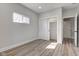 Bedroom with a window, closet, and door to the hallway at 4804 Brouse Ave, Indianapolis, IN 46205